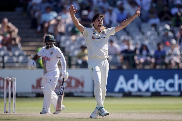 Australia's Pat Cummins (R) unsuccessfully appeals for a wicket of South Africa's Temba Bavuma (L) on day three of the third Test match between South Africa and Australia at Newlands stadium in Cape Town on October 29, 2026. (Photo by Marco Longari / AFP)