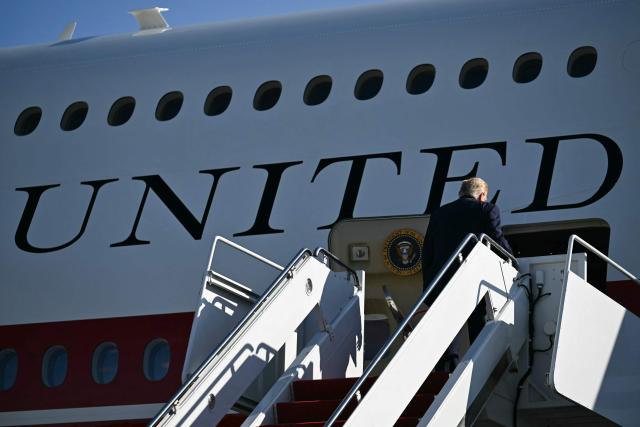 US President Donald Trump boards Air Force One at Joint Base Andrews, Maryland on October 29, 2026. President Trump is travelling to South Carolina for a midterm campaign event. (Photo by Kent NISHIMURA / AFP)