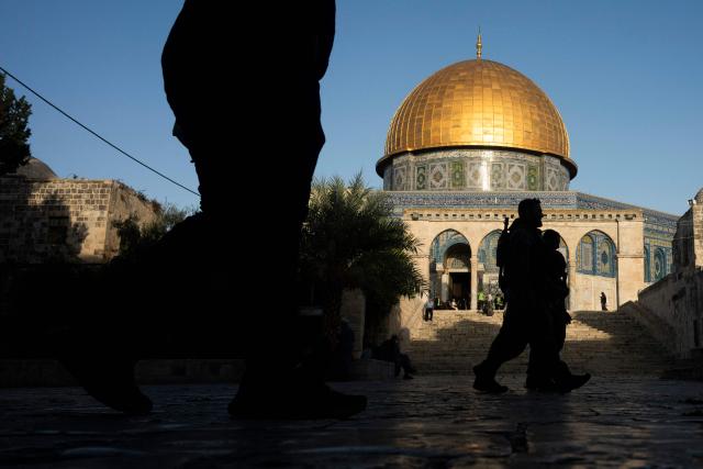 Members of the Israeli security forces (R) patrol the Al-Aqsa Mosque compound in the Old City of Jerusalem on October 29, 2026. (Photo by Jewel SAMAD / AFP)