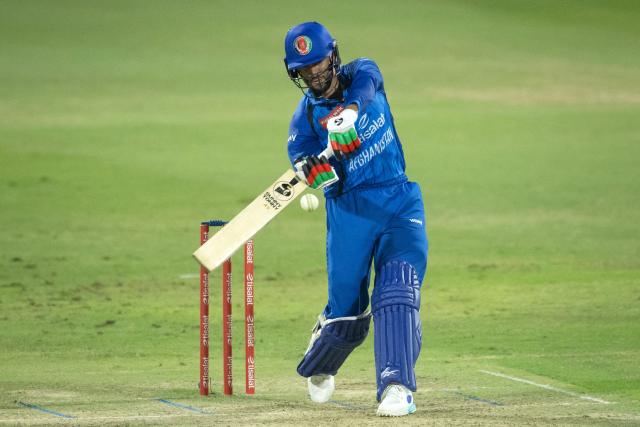 Afghanistan's Azamatullah Omarzai plays a shot during the international T20 cricket match between Afghanistan and Zimbabwe at the Sharjah Cricket Stadium in Sharjah on October 29, 2026. (Photo by FADEL SENNA / AFP)