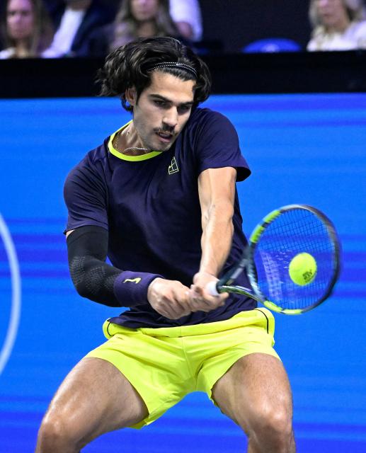 Spain’s Carlos Alcaraz returns the ball to Georgia's Nikoloz Basilashvili (not pictured) at the Erste Bank Open 2026 ATP 500 tennis tournament in Vienna, Austria, on October 29, 2026. (Photo by HELMUT FOHRINGER / APA / AFP) / Austria OUT