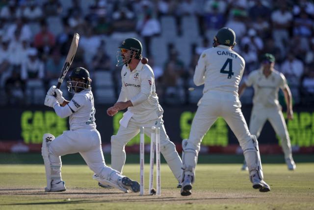 TOPSHOT - South Africa's Temba Bavuma is bowled by Australia's Nathan Lyon on day three of the third Test match between South Africa and Australia at Newlands stadium in Cape Town on October 29, 2026. (Photo by Marco Longari / AFP)