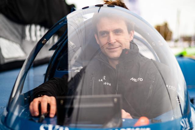 French skipper Tom Laperche poses for a photo session aboard his multihull Ultim class “SVR Lazartigue“ before the start of the 13th Route du Rhum Destination Guadeloupe on October 29, 2026. (Photo by Sebastien Salom-Gomis / AFP)