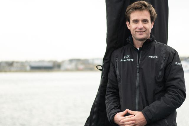 French skipper Tom Laperche poses for a photo session aboard his multihull Ultim class “SVR Lazartigue“ before the start of the 13th Route du Rhum Destination Guadeloupe on October 29, 2026. (Photo by Sebastien Salom-Gomis / AFP)