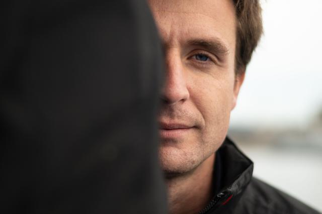 French skipper Tom Laperche poses for a photo session aboard his multihull Ultim class “SVR Lazartigue“ before the start of the 13th Route du Rhum Destination Guadeloupe on October 29, 2026. (Photo by Sebastien Salom-Gomis / AFP)