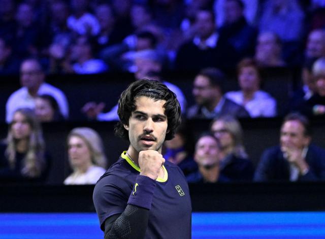 Spain’s Carlos Alcaraz reacts while playing against Georgia's Nikoloz Basilashvili (not pictured) at the Erste Bank Open 2026 ATP 500 tennis tournament in Vienna, Austria, on October 29, 2026. (Photo by HELMUT FOHRINGER / APA / AFP) / Austria OUT