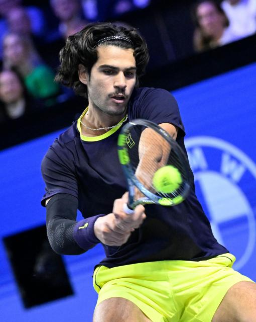 Spain’s Carlos Alcaraz returns the ball to Georgia's Nikoloz Basilashvili (not pictured) at the Erste Bank Open 2026 ATP 500 tennis tournament in Vienna, Austria, on October 29, 2026. (Photo by HELMUT FOHRINGER / APA / AFP) / Austria OUT
