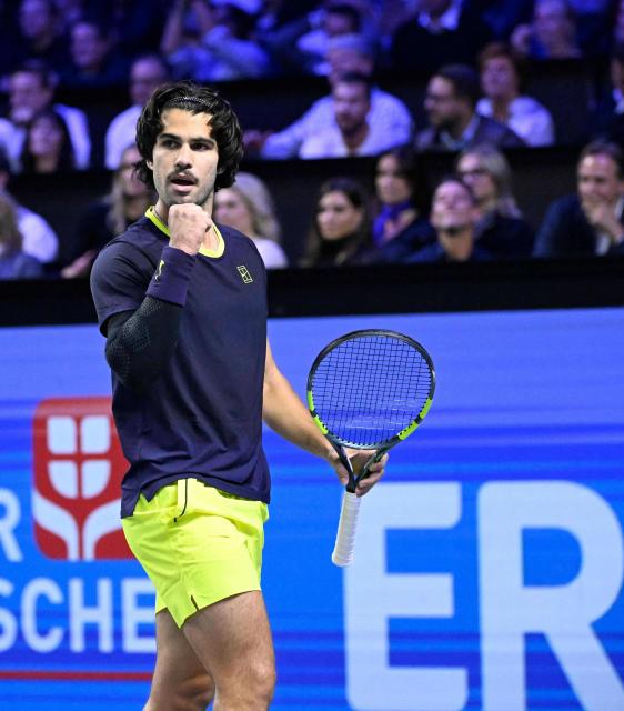 Spain’s Carlos Alcaraz reacts while playing against Georgia's Nikoloz Basilashvili (not pictured) at the Erste Bank Open 2026 ATP 500 tennis tournament in Vienna, Austria, on October 29, 2026. (Photo by HELMUT FOHRINGER / APA / AFP) / Austria OUT