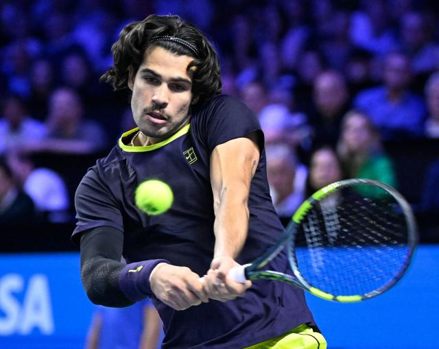 Spain’s Carlos Alcaraz returns the ball to Georgia's Nikoloz Basilashvili (not pictured) at the Erste Bank Open 2026 ATP 500 tennis tournament in Vienna, Austria, on October 29, 2026. (Photo by HELMUT FOHRINGER / APA / AFP) / Austria OUT