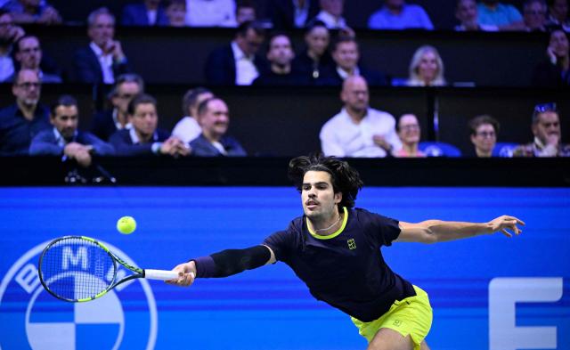 Spain’s Carlos Alcaraz returns the ball to Georgia's Nikoloz Basilashvili (not pictured) at the Erste Bank Open 2026 ATP 500 tennis tournament in Vienna, Austria, on October 29, 2026. (Photo by HELMUT FOHRINGER / APA / AFP) / Austria OUT