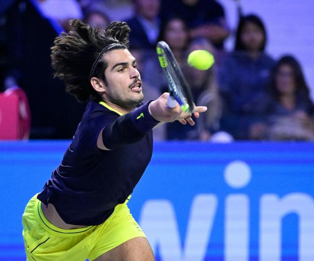 Spain’s Carlos Alcaraz returns the ball to Georgia's Nikoloz Basilashvili (not pictured) at the Erste Bank Open 2026 ATP 500 tennis tournament in Vienna, Austria, on October 29, 2026. (Photo by HELMUT FOHRINGER / APA / AFP) / Austria OUT