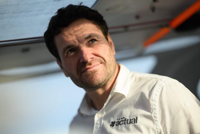 "Actual Ultim 4" Ultim Class French sailor Anthony Marchand poses aboard his boat in the harbour of Saint-Malo, western France, a few days before the start of the 13th Route du Rhum - Destination Guadeloupe, on October 29, 2026. From Saint-Malo in Brittany to Pointe-à-Pitre in Guadeloupe, 115 skippers across 6 classes will take the start on November 1, 2026, in this solo transatlantic sailing race. (Photo by Loic VENANCE / AFP)