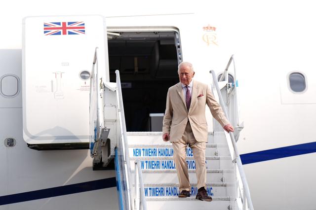 Britain's King Charles III disembarks from his plane at Cheddi Jagan International Airport in Timehri, Guyana on October 29, 2026. King Charles III is on an official visit to Guyana. (Photo by Aaron Chown / POOL / AFP)