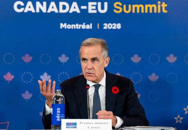 Canada's Prime Minister Mark Carney speaks during a roundtable event with business leaders during the 21st EU-Canada summit in Montreal, Quebec, Canada on October 29, 2026. The EU and Canada want to bring their relationship to the "highest level possible" as they face a "world of growing rivalries," said Ursula von der Leyen, the 27-nation bloc's chief said Thursday ahead of a meeting with Canadian leader Mark Carney. Brussels and Ottawa are to lay the groundwork for an ever-closer partnership at a two-day summit in Montreal, as they navigate uncertain ties with the United States and China. (Photo by Christopher Katsarov / POOL / AFP)