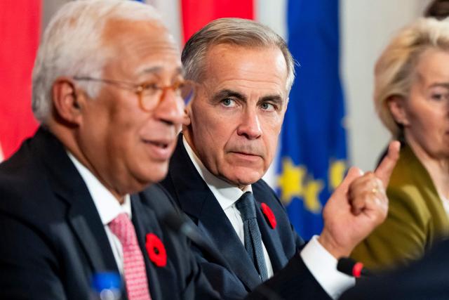 (L/R) European Council President Antonio Costa speaks alongside Canada's Prime Minister Mark Carney during a roundtable with business leaders during the 21st EU-Canada summit in Montreal, Quebec, Canada on October 29, 2026. The EU and Canada want to bring their relationship to the "highest level possible" as they face a "world of growing rivalries," the 27-nation bloc's chief said Thursday ahead of a meeting with Canadian leader Mark Carney. Brussels and Ottawa are to lay the groundwork for an ever-closer partnership at a two-day summit in Montreal, as they navigate uncertain ties with the United States and China. (Photo by Christopher Katsarov / POOL / AFP)