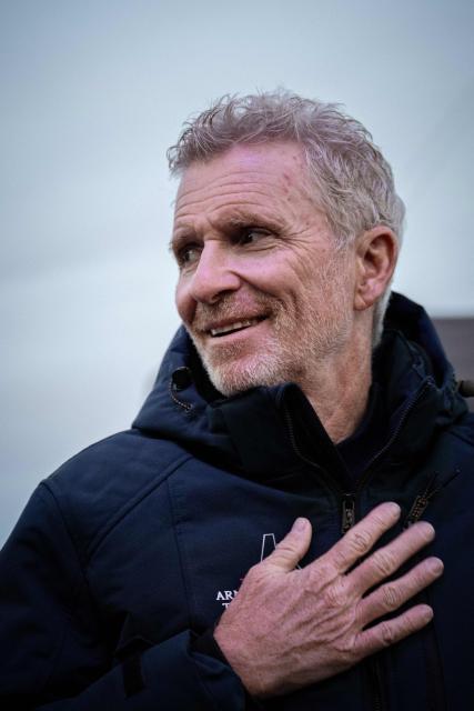 French television presenter Denis Brogniart reacts prior to the inauguration of the Ultim multihull Armand Thiery, in the harbour of Saint-Malo northwestern France, on October 29, 2026 a few days prior to the start of the Route du Rhum solo sailing race from Saint-Malo, to Pointe-a-Pitre in the French overseas island of Guadeloupe. (Photo by Lou BENOIST / AFP)