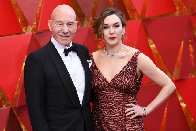 (FILES) British actor Patrick Stewart (L) and his wife US singer Sunny Ozell arrive for the 90th Annual Academy Awards on March 4, 2018, in Hollywood, California. Patrick Stewart, the British Shakespearean actor who became a Hollywood megastar through "Star Trek" and the "X-Men" franchises has died, an official statement said on October 29. "We announce with great sorrow the passing of Sir Patrick Stewart yesterday at his home in Los Angeles, in the loving care of his beloved wife Sunny, following a brief and poignant journey with Alzheimer's Disease and Lewy Body Dementia," the statement said. (Photo by ANGELA WEISS / AFP)
