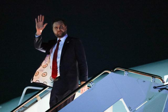 US Vice President JD Vance waves while disembarking from Air Force Two at Joint Base Andrews in Maryland, on October 29, 2026, following a campaign trip to Texas. (Photo by Evan Vucci / POOL / AFP)