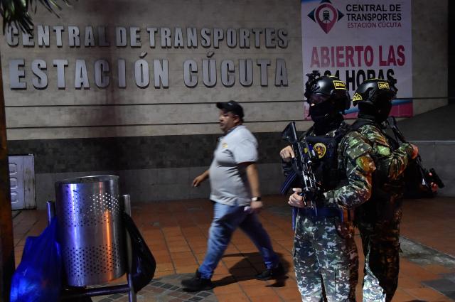 Colombian soldiers stand guard at the Transport Terminal in Cucuta, Norte de Santander, Colombia, on October 29, 2026. Colombian President Abelardo de la Espriella on October 29, ordered the temporary "militarization" of a city bordering Venezuela after a wave of recent violence linked to criminal groups. Over the past few days in Cucuta, the capital of the Norte de Santander department, a mayoral candidate was murdered and a bombing left four police officers injured, according to the local government. (Photo by Schneyder Mendoza / AFP)