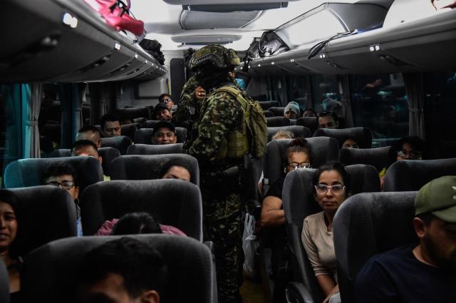 Colombian soldiers inspect a bus at the Transport Terminal in Cúcuta, Norte de Santander, Colombia on October 29, 2026. Colombian President Abelardo de la Espriella on Thursday ordered the temporary "militarization" of a city bordering Venezuela after a wave of recent violence linked to criminal groups. Over the past few days in Cucuta, the capital of the Norte de Santander department, a mayoral candidate was murdered and a bombing left four police officers injured, according to the local government. (Photo by Schneyder Mendoza / AFP)