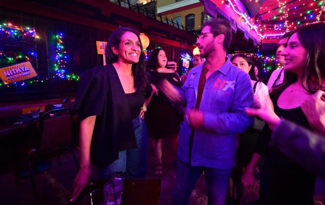 Los Angeles Mayoral Democratic candidate Nithya Raman meets with Latino voters at La Cita Bar in Los Angeles on October 29, 2026. Raman is facing incumbant Los Angeles Mayor Karen Bass in the November 3 election. (Photo by Frederic J. BROWN / AFP)