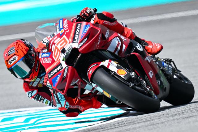 Ducati Lenovo Team's Spanish rider Marc Marquez takes a corner during the first practice session of the MotoGP Malaysian Grand Prix at the Sepang International Circuit in Sepang on October 30, 2026. (Photo by Mohd Rasfan / AFP)