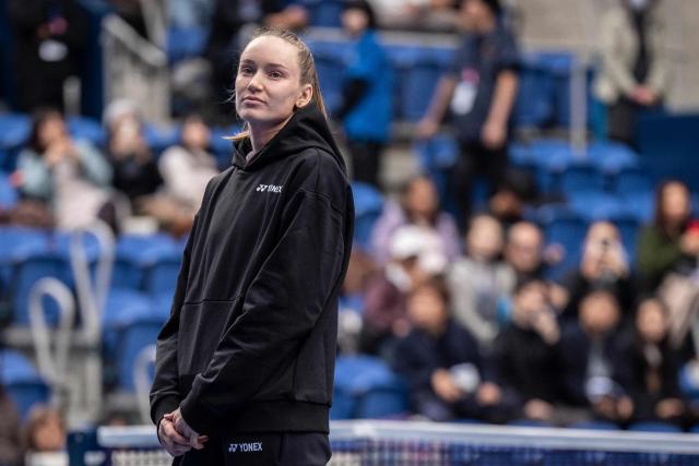 Kazakhstan's Elena Rybakina looks on as she speaks after retiring due to an injury from her quarter-final match against Canada's Leylah Fernandez during the WTA Pan Pacific Open tennis tournament at Ariake Coliseum in Tokyo on October 30, 2026. Elena Rybakina withdrew with a neck injury, a day after she secured the year-end world number one ranking. (Photo by Yuichi YAMAZAKI / AFP)