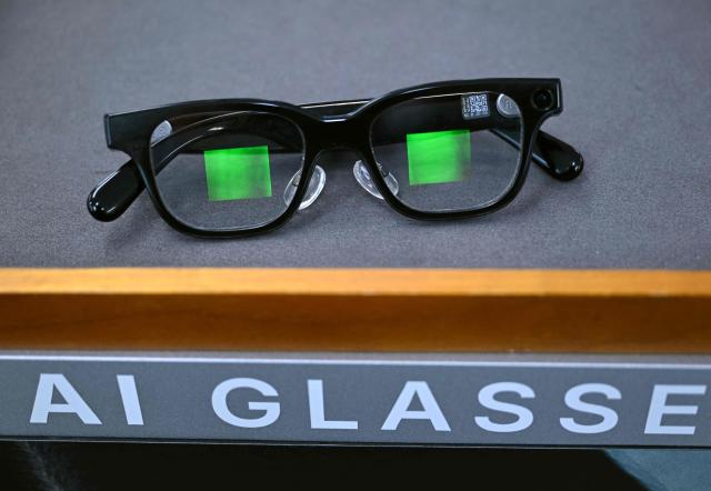 A pair of smart glasses is pictured on display at the Eyedaq eyewear store in Seoul on October 30, 2026. South Korea will file criminal complaints against students caught cheating with smart glasses and toughen penalties for their use, a government official told AFP on October 30. (Photo by Jung Yeon-je / AFP)