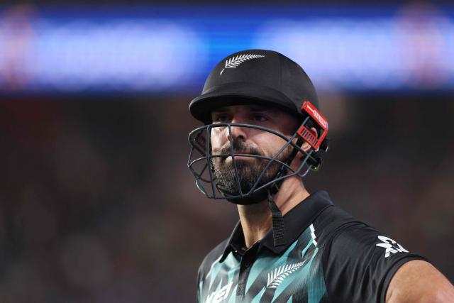 New Zealand's Daryl Mitchell reacts after being dismissed during the 4th T20 cricket match between New Zealand and India at Eden Park in Auckland on October 30, 2026. (Photo by Michael Bradley / AFP)