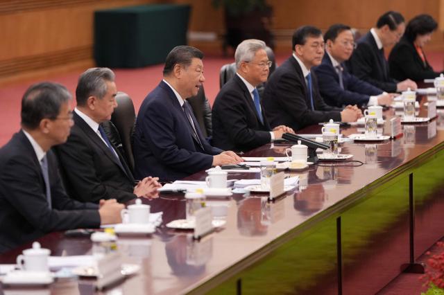 Chinese President Xi Jinping (3rd L) attends a meeting with Switzerland's President Guy Parmelin at the Great Hall of the People in Beijing on October 30, 2026. (Photo by Kai Naito / POOL / AFP)
