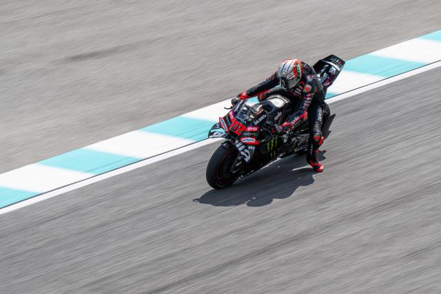 Aprilia Racing's Italian rider Marco Bezzecchi brakes before taking a corner during a practice session ahead of the MotoGP Malaysian Grand Prix at the Sepang International Circuit in Sepang on October 30, 2026. (Photo by Mohd Rasfan / AFP)