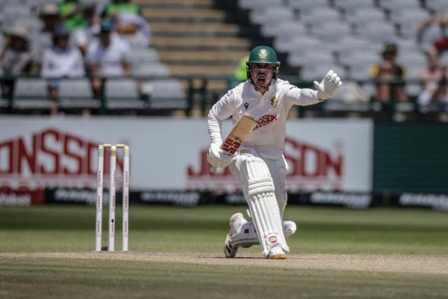South Africa's Matthew Breetzke gestures towards his teammate on day four of the third Test match between South Africa and Australia at Newlands stadium in Cape Town on October 30, 2026. (Photo by Marco Longari / AFP)