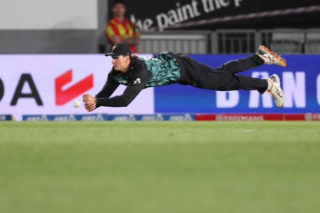 New Zealand's Bevon Jacobs is unable to take a catch during the 4th T20 cricket match between New Zealand and India at Eden Park in Auckland on October 30, 2026. (Photo by Michael Bradley / AFP)