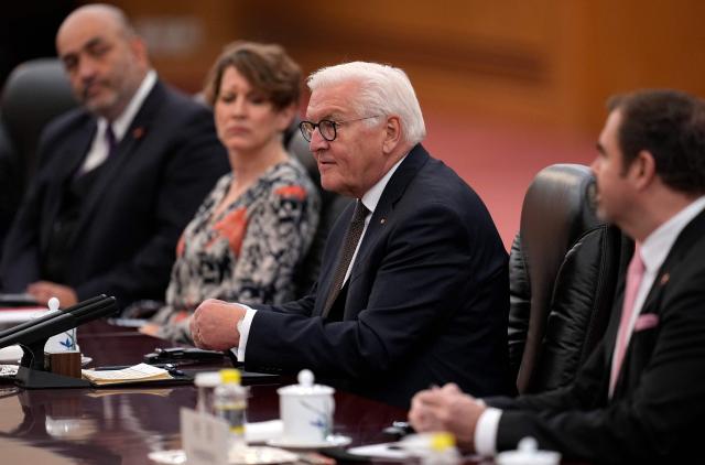 Germany’s President Frank-Walter Steinmeier (C) attends a meeting with Chinese President Xi Jinping at the Great Hall of the People in Beijing on October 30, 2026. (Photo by Kai Naito / POOL / AFP)