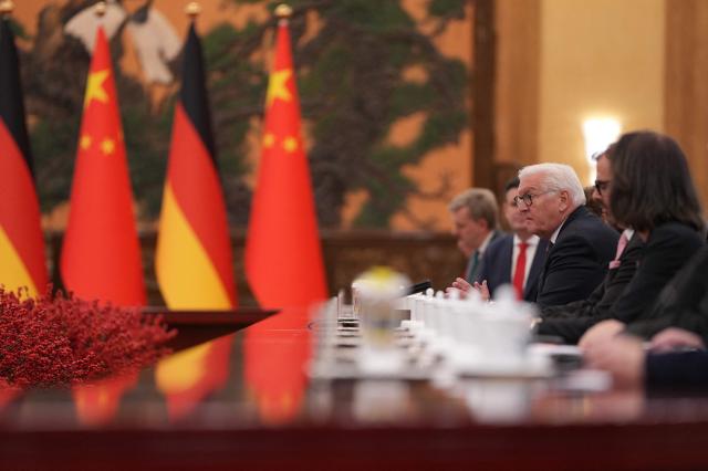 Germany’s President Frank-Walter Steinmeier attends a meeting with Chinese President Xi Jinping at the Great Hall of the People in Beijing on October 30, 2026. (Photo by Kai Naito / POOL / AFP)