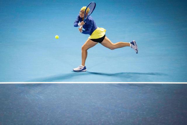 Russia's Diana Shnaider hits a return against Philippines' Alexandra Eala during their quarter-final match at the WTA Pan Pacific Open tennis tournament at Ariake Coliseum in Tokyo on October 28, 2026. (Photo by Yuichi YAMAZAKI / AFP)