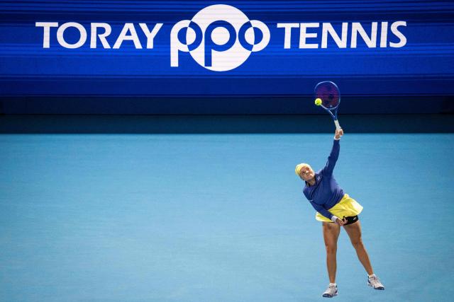 Russia's Diana Shnaider serves against Philippines' Alexandra Eala during their quarter-final match at the WTA Pan Pacific Open tennis tournament at Ariake Coliseum in Tokyo on October 28, 2026. (Photo by Yuichi YAMAZAKI / AFP)