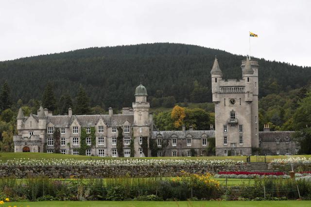 (FILES) The Royal Standard is seen flying at Balmoral Castle in Scotland on September 20, 2017. Scottish police are in the "very early stage" of probing late sex offender Jeffrey Epstein and his accomplice Ghislaine Maxwell's reported 1999 stay at the royal Balmoral estate at the invite of ex-prince Andrew, UK media reported Friday, October 30, 2026. (Photo by Andrew Milligan / POOL / AFP)