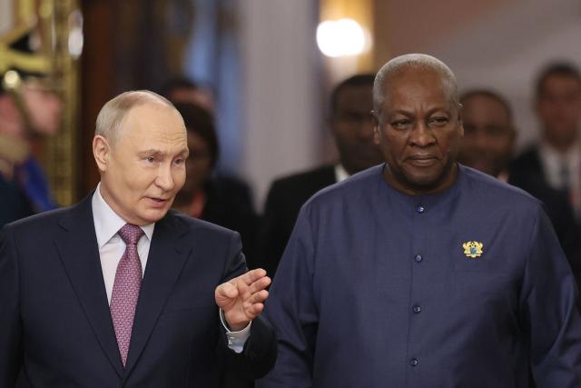 Russia's President Vladimir Putin (L) and Ghana's President John Dramani Mahama (R) arrive for their talks on the sidelines of the Russia-Africa summit in Moscow on October 30, 2026. (Photo by Anastasia Barashkova / POOL / AFP)