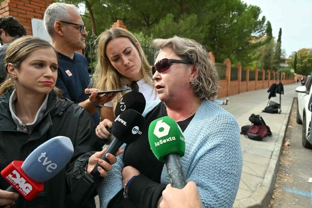 Marisa Liebana (R), aunt of Francisco Jose Barbero, 33 years old, one of the victims of the train accident, answers journalists at El Buen Pastor Diocesan House, the victims' identification place, in Toledo on October 30, 2026, two days after a deadly high-speed train collision south of Madrid. The rail disaster, which killed at least 69 people, is one of Europe's deadliest such disasters this century. The second such accident to strike Spain this year will raise fresh questions about the country's rail safety, with the transport minister speaking of an "error" and "inexplicable circumstances" that led to the crash. (Photo by JAVIER SORIANO / AFP)