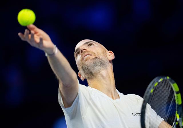 France's Adrian Mannarino serves the ball to Russia's Daniil Medvedev (not pictured) at the Erste Bank Open 2026 ATP 500 tennis tournament in Vienna, Austria, on October 30, 2026. (Photo by GEORG HOCHMUTH / APA / AFP) / Austria OUT