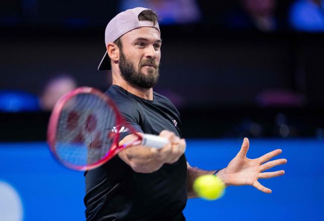 USA's Tommy Paul returns the ball to Spain’s Carlos Alcaraz 
(not pictured) during the quarter-final match at the Erste Bank Open 2026 ATP 500 tennis tournament in Vienna, Austria, on October 30, 2026. (Photo by GEORG HOCHMUTH / APA / AFP) / Austria OUT
