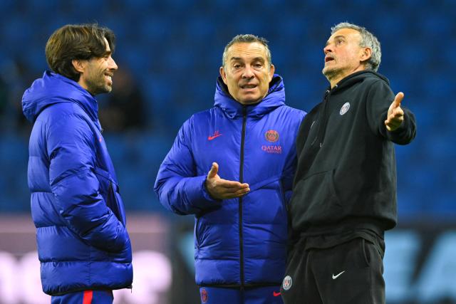 PSG's Spanish assistant coach Rafel Pol (L) and PSG's Spanish headcoach Luis Enrique (R) react ahead of the French L1 football match between Le Havre Athletic Club and Paris Saint-Germain (PSG) at Stade Oceane in Le Havre, north-western France on October 30, 2026. (Photo by Guillaume Saligot / AFP)