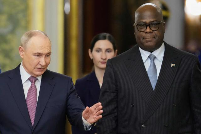 Russia's President Vladimir Putin (L) and Democratic Republic of the Congo's President Felix Tshisekedi (R) arrive for their talks on the sidelines of the Russia-Africa summit in Moscow on October 30, 2026. (Photo by Pavel Bednyakov / POOL / AFP)