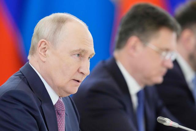 Russia's President Vladimir Putin attends a meeting with Democratic Republic of the Congo's president on the sidelines of the Russia-Africa summit in Moscow on October 30, 2026. (Photo by Pavel Bednyakov / POOL / AFP)