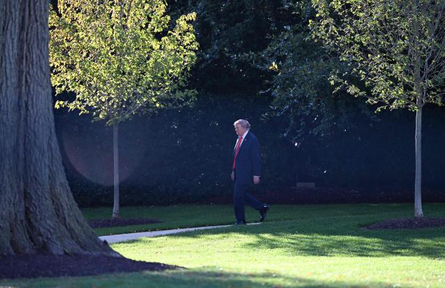 US President Donald Trump walks to board Marine One as he departs from the South Lawn of the White House in Washington, DC, on October 30, 2026. President Trump is travelling to Florida to speak at a midterm campaign rally. (Photo by Alex WROBLEWSKI / AFP)
