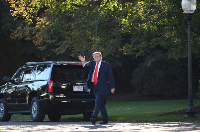 US President Donald Trump waves as he departs from the South Lawn of the White House in Washington, DC, on October 30, 2026. President Trump is travelling to Florida to speak at a midterm campaign rally. (Photo by Alex WROBLEWSKI / AFP)