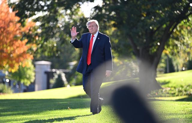 US President Donald Trump waves as he departs from the South Lawn of the White House in Washington, DC, on October 30, 2026. President Trump is travelling to Florida to speak at a midterm campaign rally. (Photo by Alex WROBLEWSKI / AFP)