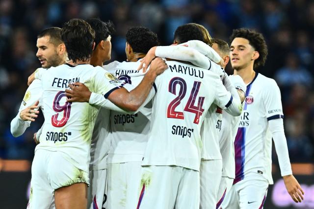 PSG's players celebrate their team's second goal during the French L1 football match between Le Havre Athletic Club and Paris Saint-Germain (PSG) at Stade Oceane in Le Havre, north-western France on October 30, 2026. (Photo by Guillaume Saligot / AFP)