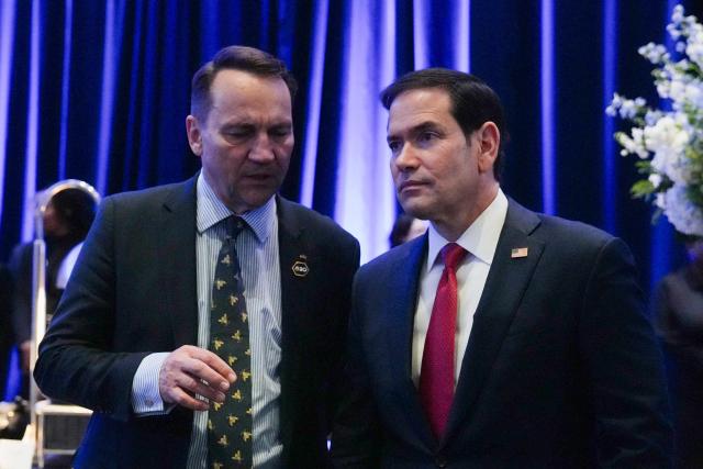 US Secretary of State Marco Rubio (R) listens to Poland's Foreign Minister Radoslaw Sikorski during the G20 foreign ministers' meeting in Atlanta, Georgia on October 30, 2026. US Secretary of State Marco Rubio is hosting his G20 counterparts, including Russia's Sergei Lavrov, for talks that are expected to be fractious, with wars in Ukraine and Iran and surging energy prices fanning discord. The foreign ministers' meeting in Atlanta, taking place just days before crucial US midterm elections, will set the stage for a December G20 leaders' summit in Miami at President Donald Trump's Doral resort. (Photo by Megan Varner / POOL / AFP)